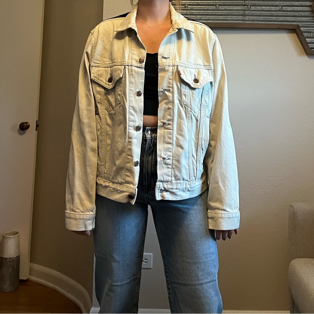 Oversized light wash Levi’s jacket with lace.